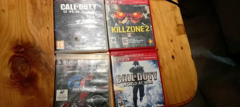 Consola PlayStation 3 con juegos y cables - 2
