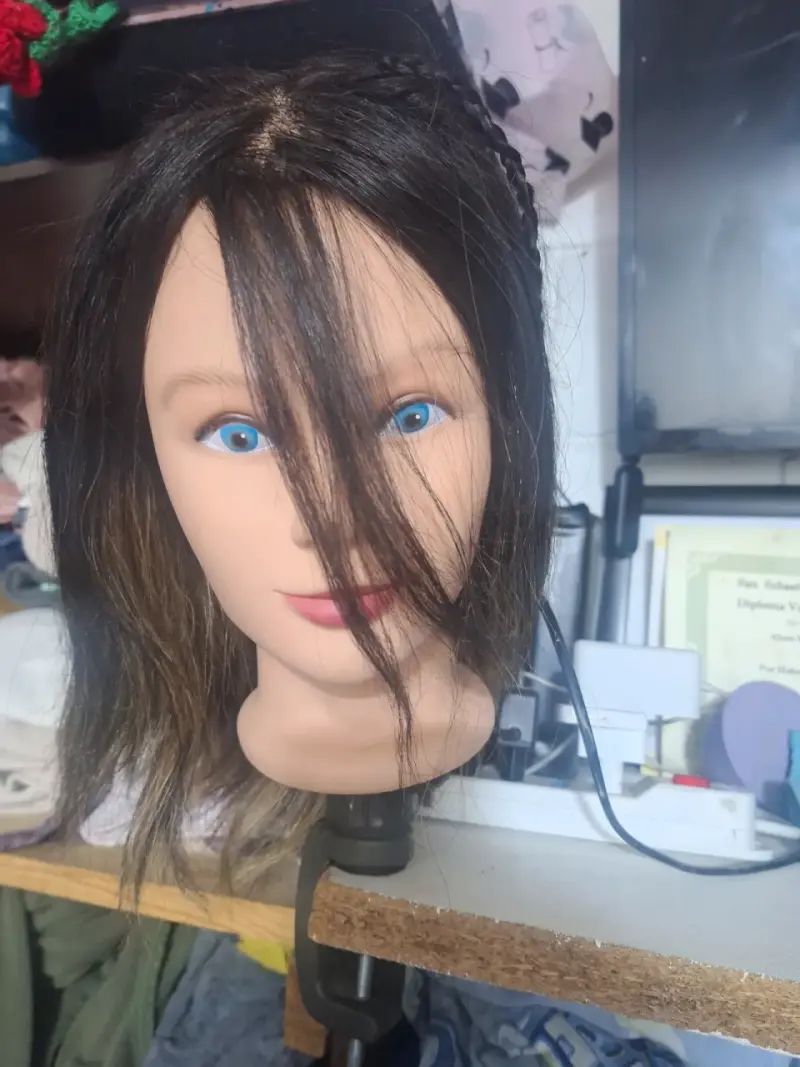 Cabeza de maniquí para práctica de peluquería