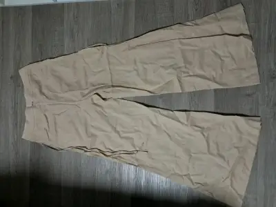 Pantalones beige de lino con lazos laterales - miniatura 2