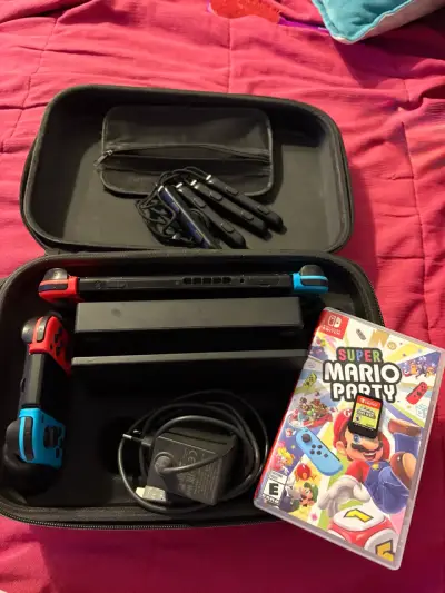 Nintendo Switch con 2 juegos adicionales - miniatura 1