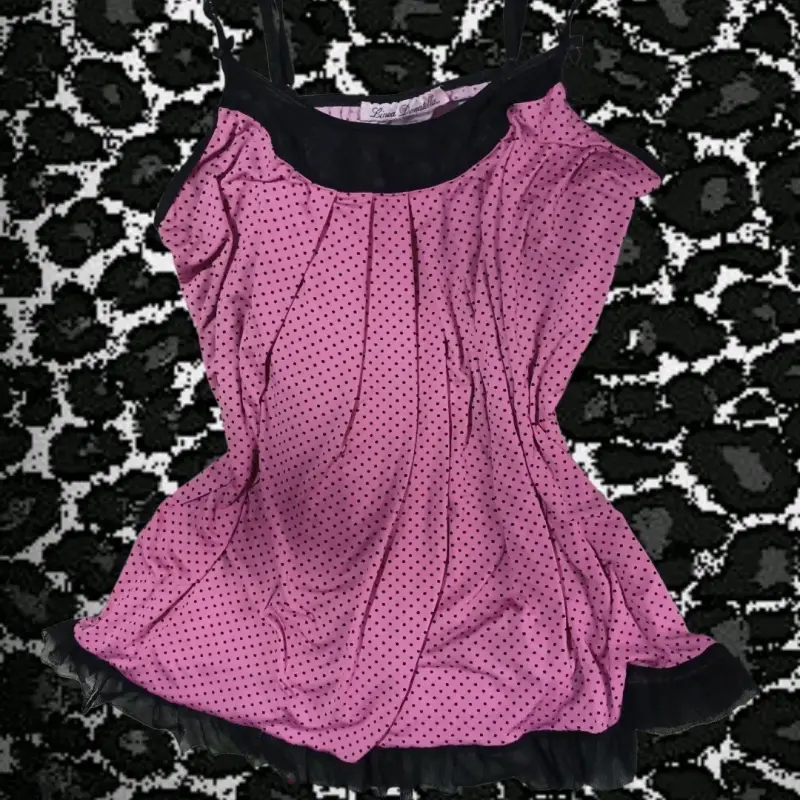 Blusa sin mangas rosa con lunares negros - 1