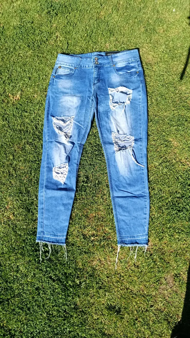 Jeans rasgados azul claro para mujer