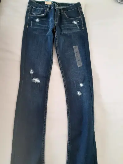 Jeans Levi's para mujer desgastados - miniatura 3