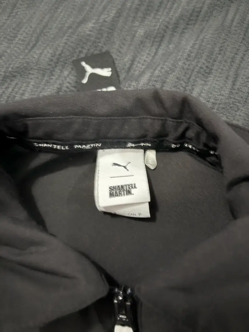 Chaqueta negra Puma x Shantell Martin con diseño gráfico - 2