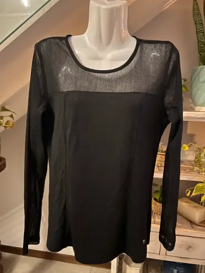 Polera negra EFESIS con transparencia - miniatura 1