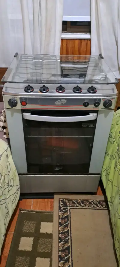 Cocina a gas Fensa con horno ,4 quemadores y grill - miniatura 1