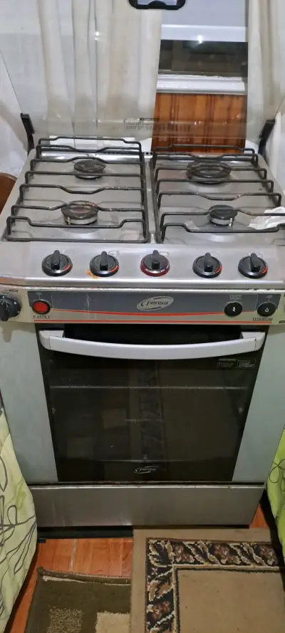 Cocina a gas Fensa con horno ,4 quemadores y grill - miniatura 3