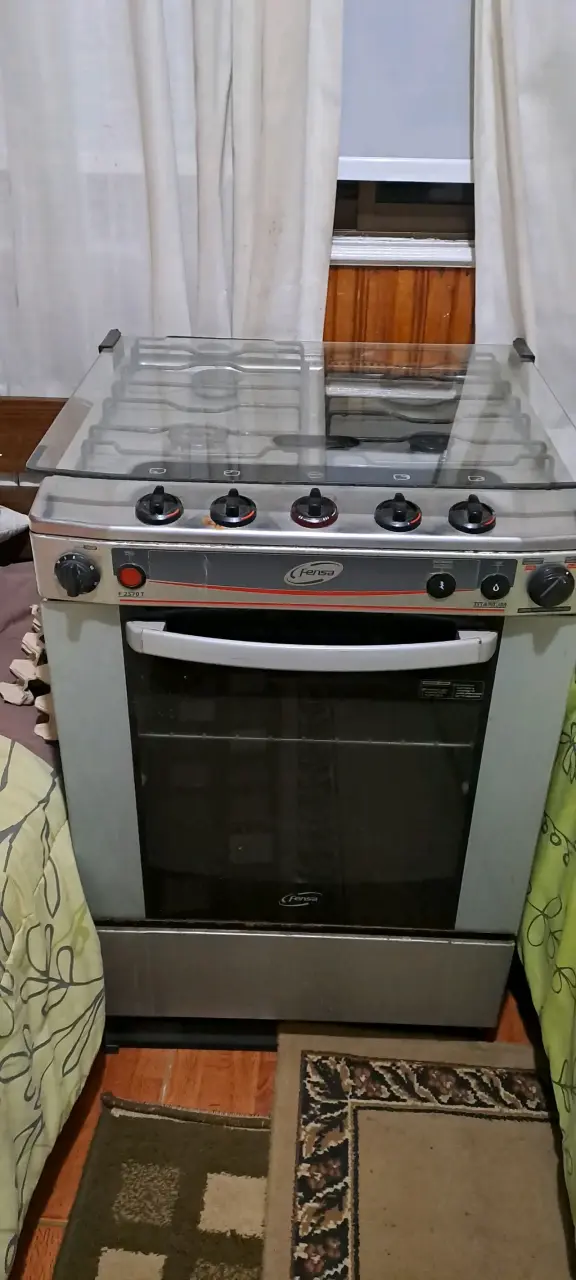 Cocina a gas Fensa con horno ,4 quemadores y grill - 6