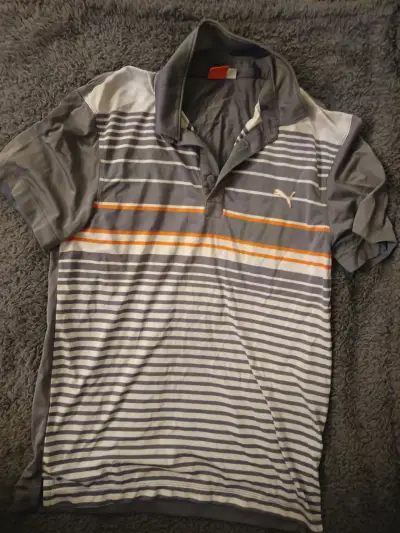 Polera deportiva Puma a rayas gris y naranja - miniatura 1