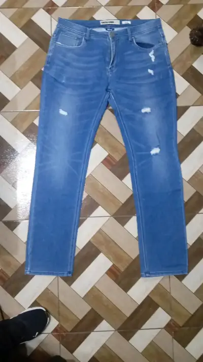 Jeans azul desgastado para hombre - miniatura 1