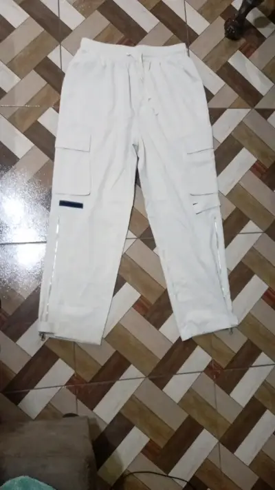 Pantalones cargo unisex color crema - miniatura 1