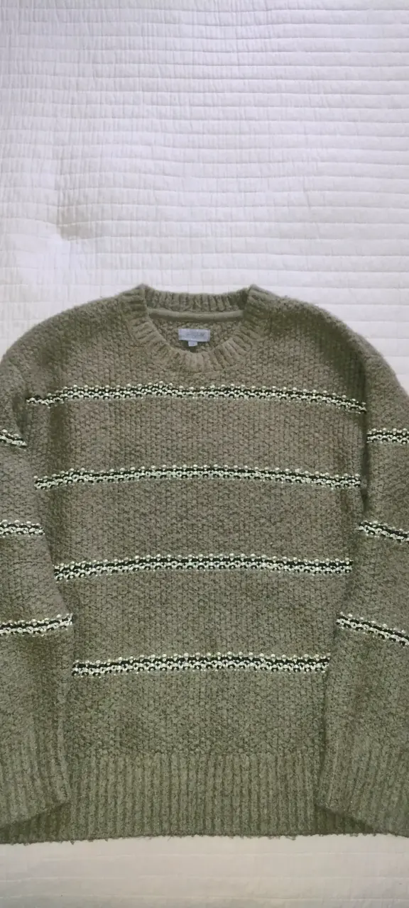Suéter de lana beige con rayas