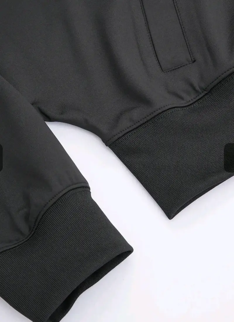 Chaqueta deportiva negra con cierre y rayas - 4