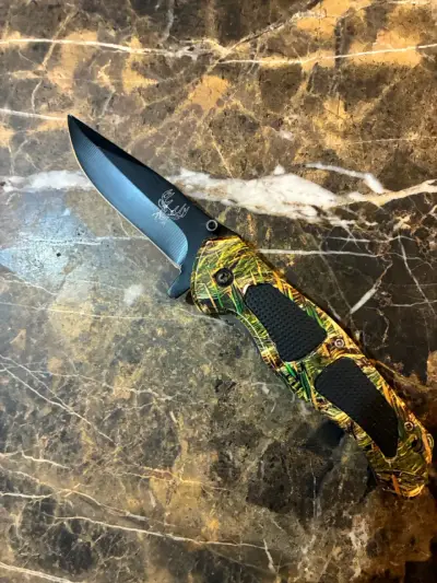 Navaja plegable táctico con diseño camuflaje - miniatura 2