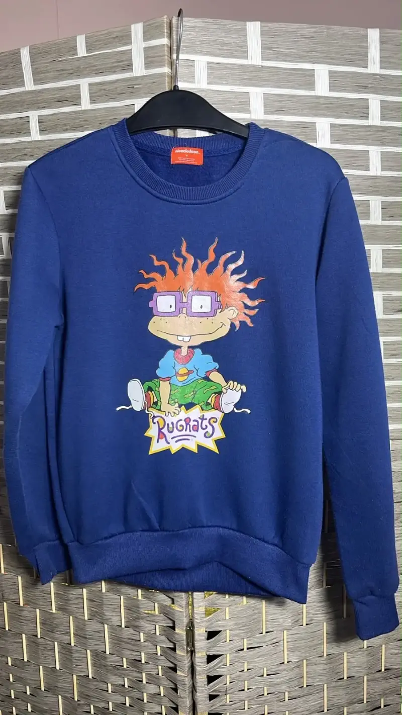 Polerón azul Rugrats con diseño de Chuckie