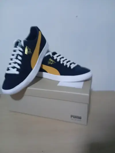 Zapatillas deportivas Puma negras y doradas - miniatura 3