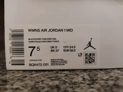 Zapatillas Air Jordan 1 Mid Negro y Azul - miniatura 1