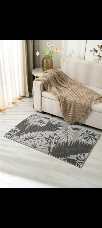 Alfombra decorativa con diseño floral y geométrico - miniatura 1