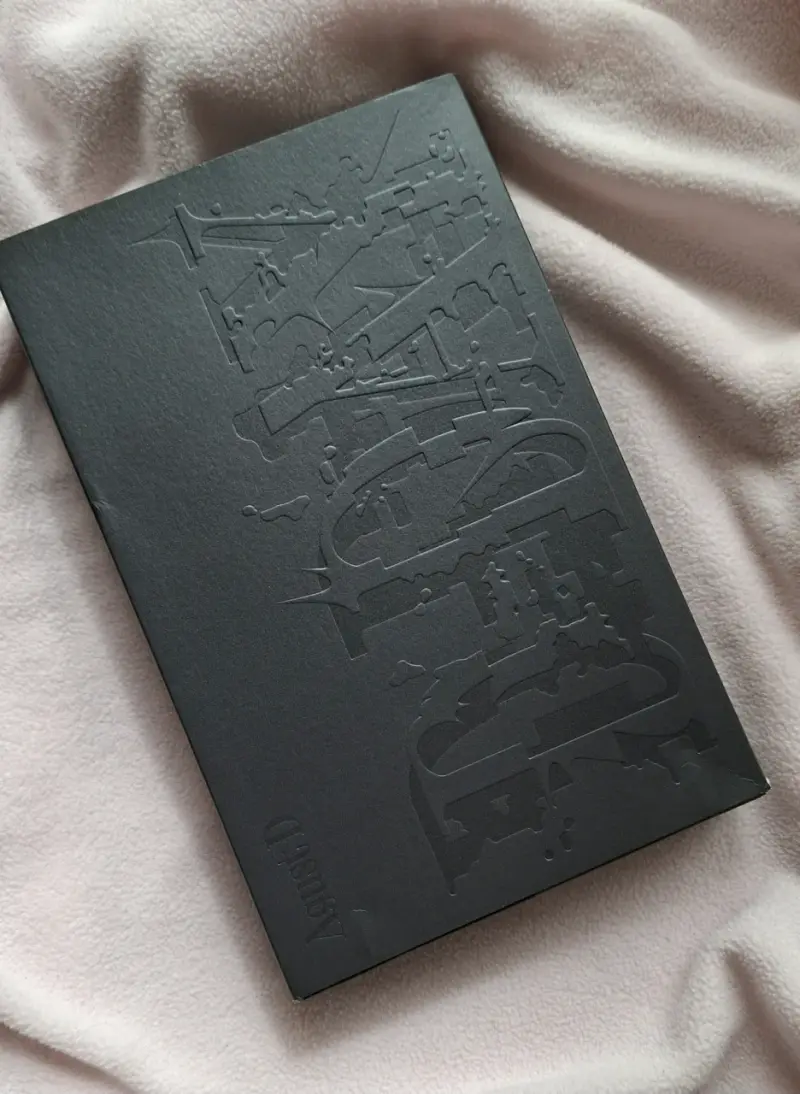 Álbum de música Agust D con tarjetas fotográficas