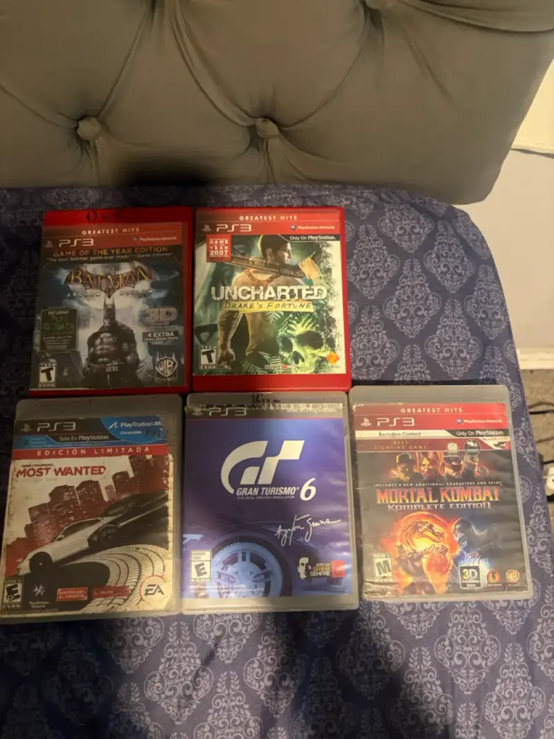 Consola PlayStation 3 con control y juegos - 2