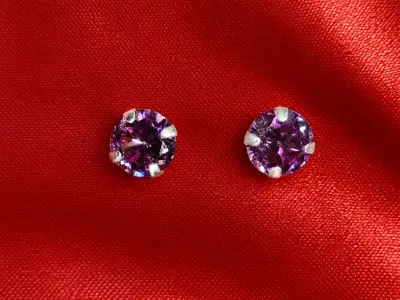 Aros de plata con piedras moradas - miniatura 1