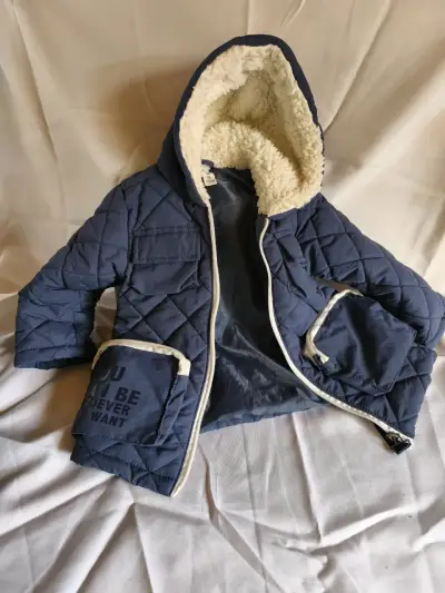 Chaqueta acolchada azul para niño con capucha - miniatura 1