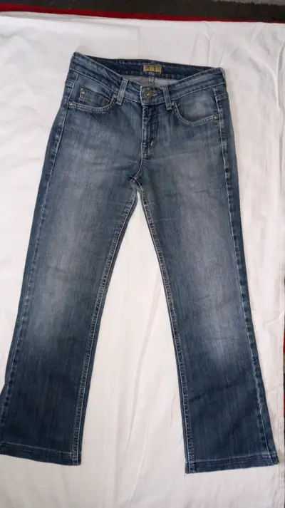 Jeans de mezclilla azul con bordado - miniatura 1