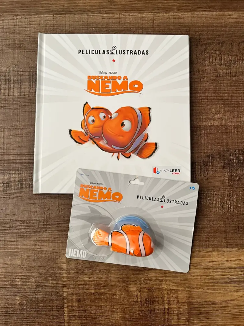 Libro ilustrado y figura de Buscando a Nemo - 1