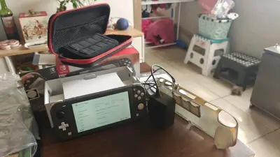 Consola Nintendo Switch Lite con accesorios - miniatura 1