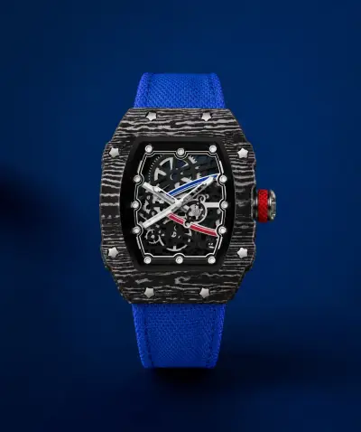Reloj de lujo con correa azul y diseño esqueleto - miniatura 1