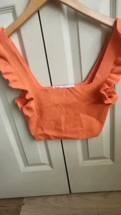 Top corto naranja con volantes Zara - miniatura 1