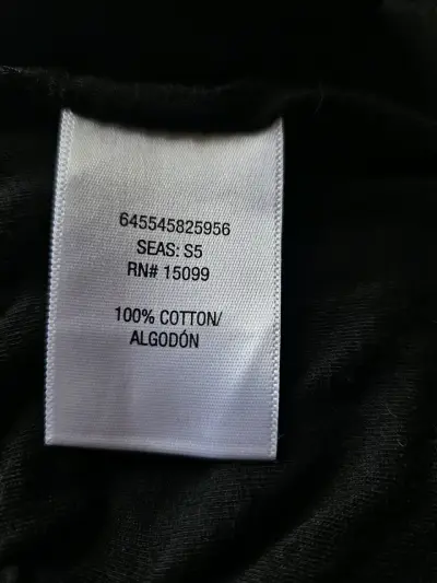 Polera sin mangas negra con texto "Eat Shop Sleep Repeat" - miniatura 6