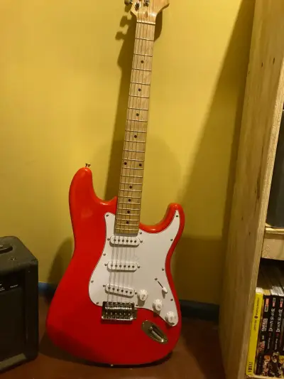 Guitarra eléctrica Freeman roja con amplificador - miniatura 2
