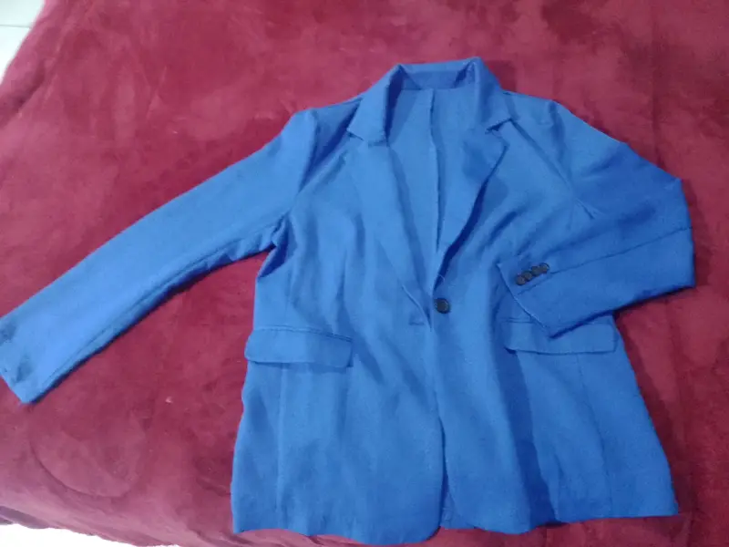 Blazer azul para mujer en buen estado
