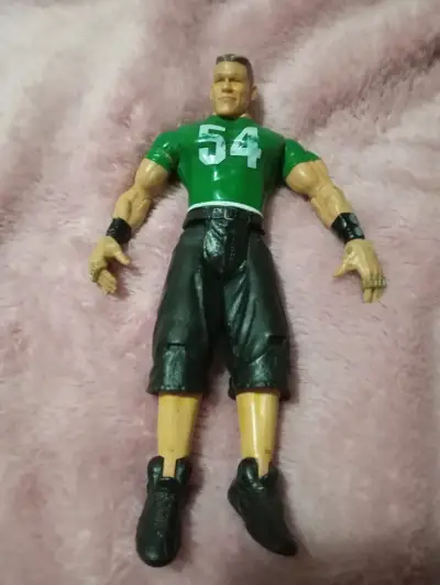Figura de acción luchador con camiseta verde - miniatura 1