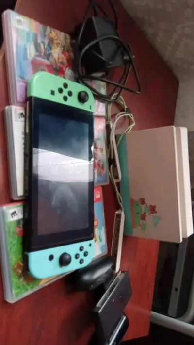 Consola Nintendo Switch con juegos y accesorios - miniatura 1