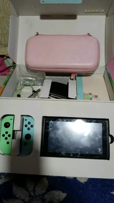Consola Nintendo Switch con juegos y accesorios - miniatura 2