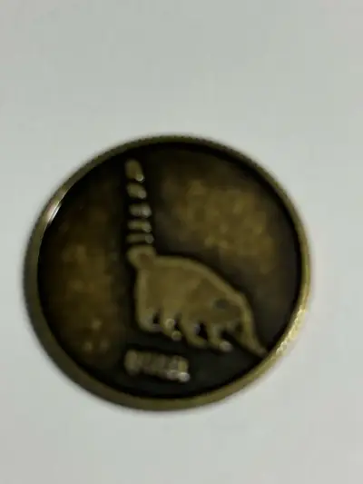Moneda con diseño de oso hormiguero - miniatura 1