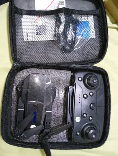 Drone plegable con cámara dual y control remoto - miniatura 2