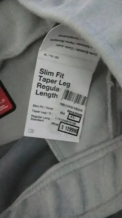Pantalones deportivos Nike gris con logo - miniatura 2
