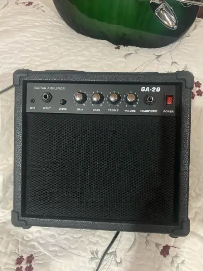 Guitarra eléctrica verde con amplificador - miniatura 5