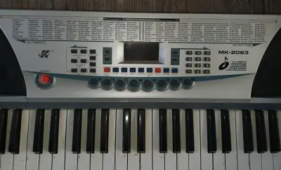 Teclado electrónico MK-2083 con 100 timbres y ritmos - miniatura 1