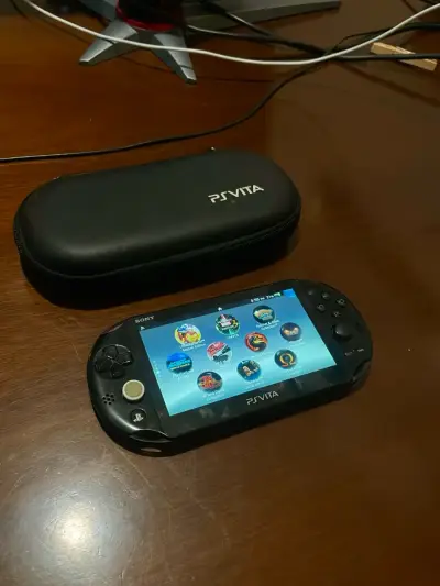 PS VITA SLIM DESBLOQUEADA + SD 128GB | JUEGOS INST - miniatura 1