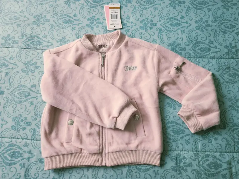 Chaqueta rosa para niña Juicy Couture con cierre