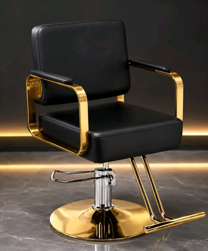 Silla de peluquería negra con detalles dorados