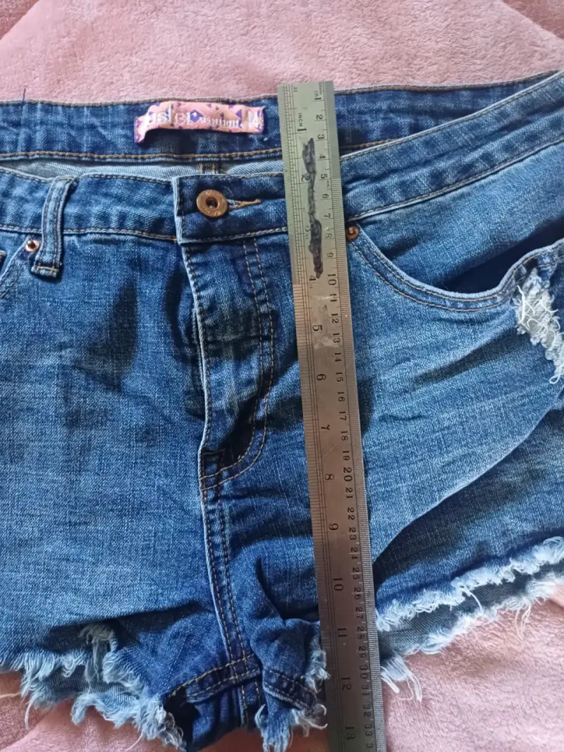 Shorts de mezclilla desgastados para mujer - 3