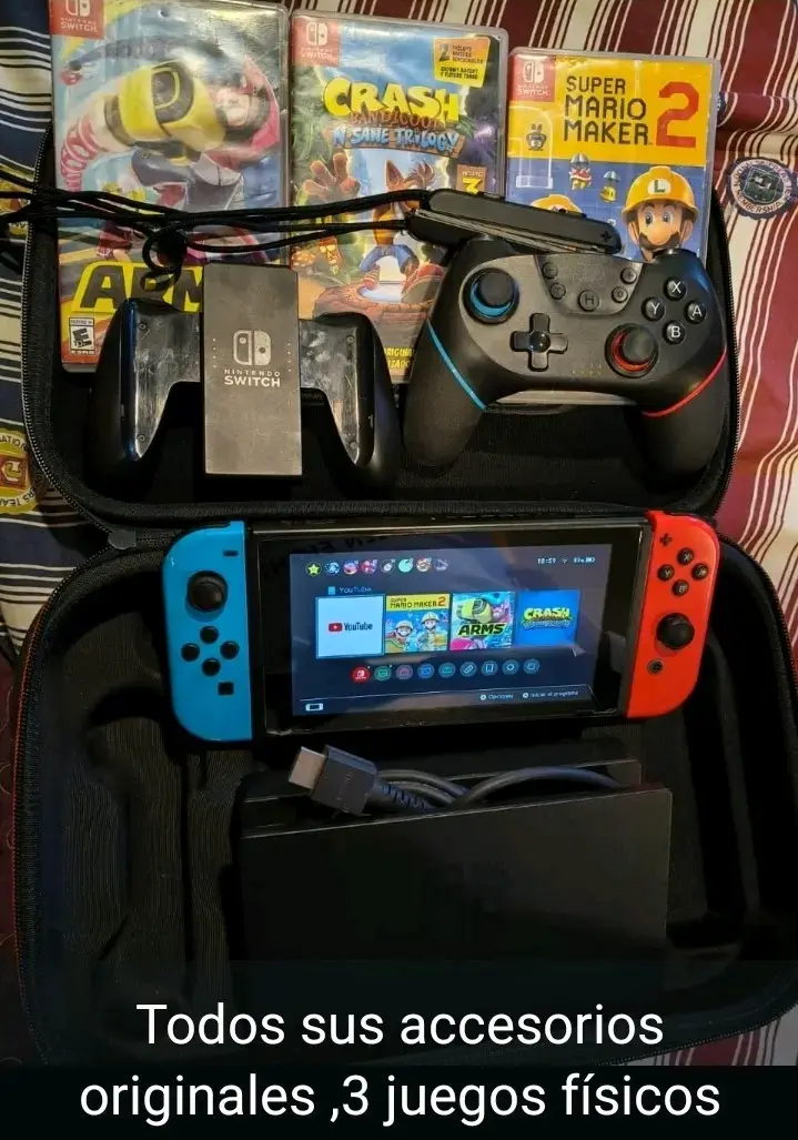 Nintendo Switch con accesorios y 3 juegos