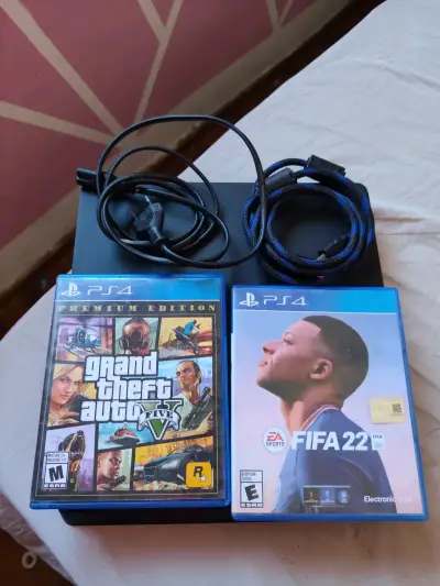Consola PS4 con juegos GTA V , FIFA 22 y pes 2020 - miniatura 1