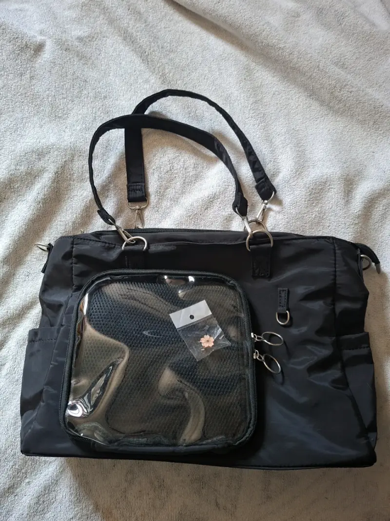 Bolso negro con bolsillo transparente - 1