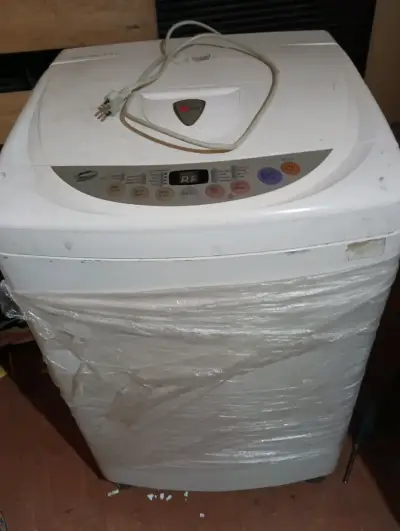 Lavadora LG Fuzzy Logic 8.5 kg en buen estado - miniatura 1